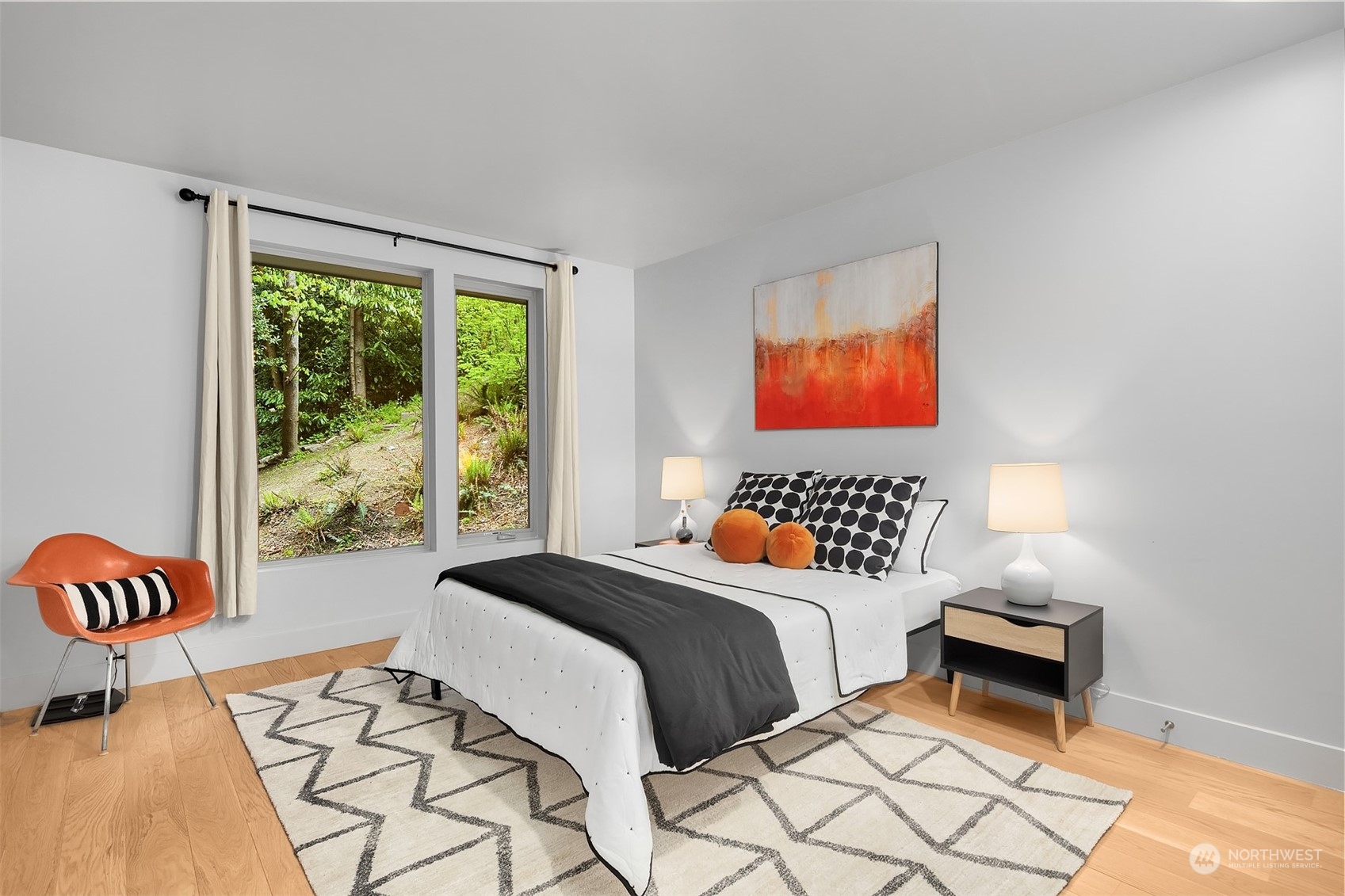 4312 West Cramer Street Seattle, WA 98199 - Photo 27 of 40 a bedroom with a bed and a window