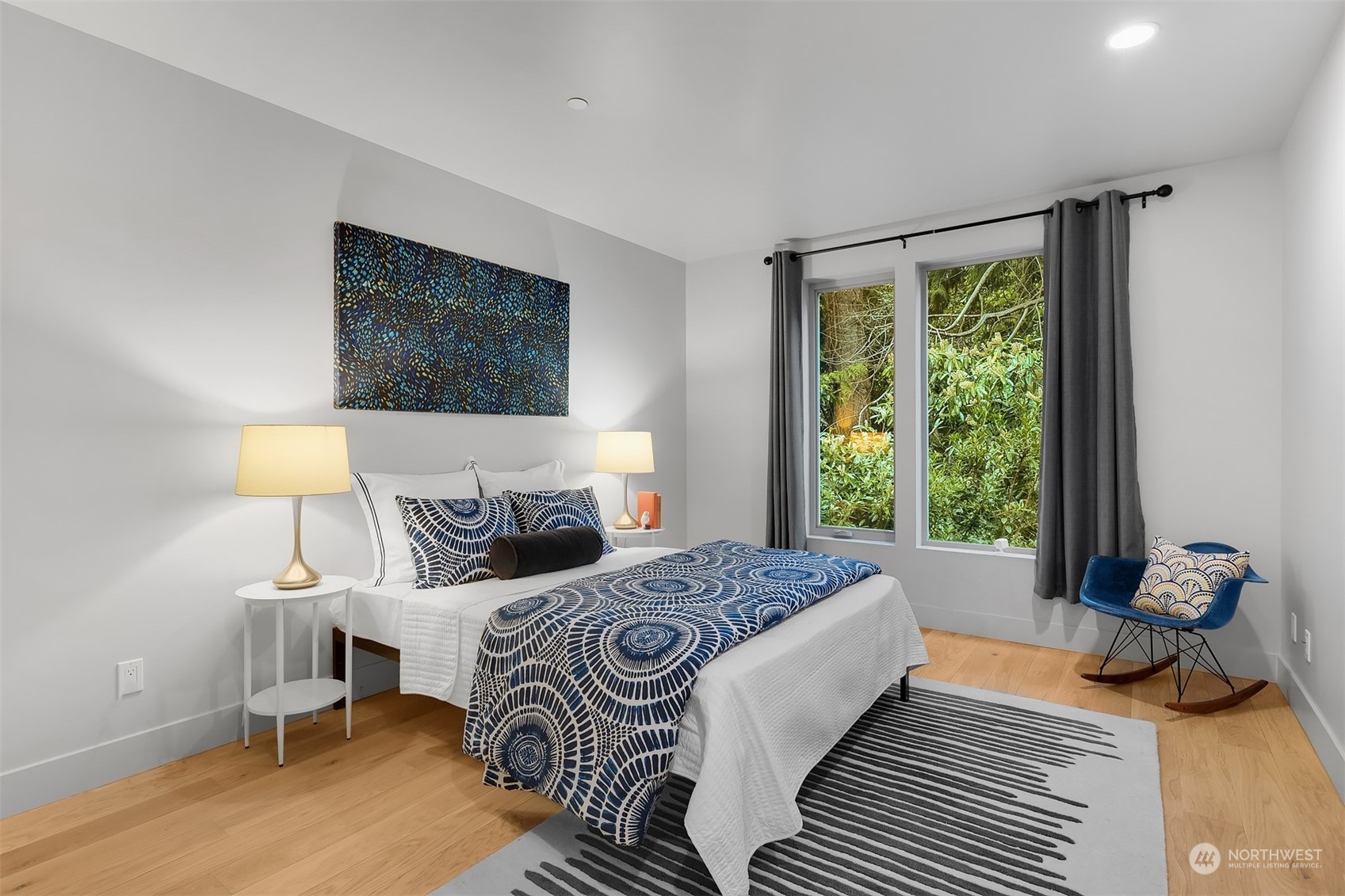 4312 West Cramer Street Seattle, WA 98199 - Photo 28 of 40 a bedroom with a bed and a window