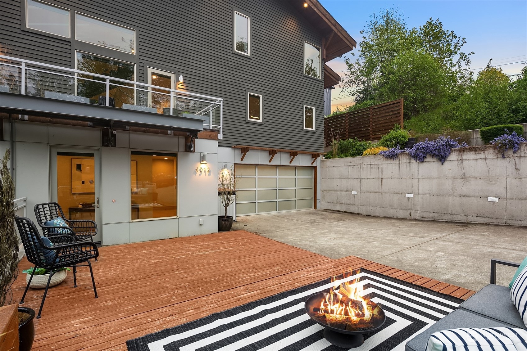 4312 West Cramer Street Seattle, WA 98199 - Photo 37 of 40 a backyard of a house with barbeque oven