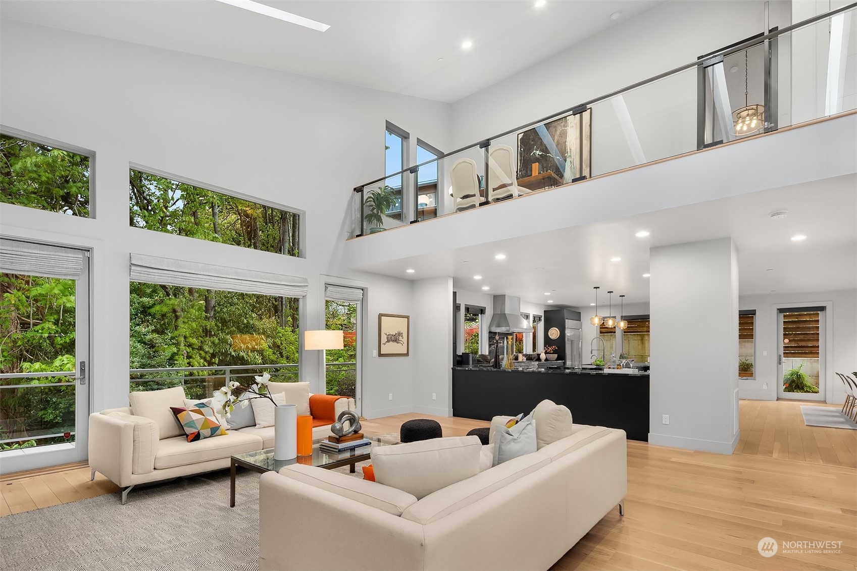 4312 West Cramer Street Seattle, WA 98199 - Photo 6 of 40 a living room with furniture and a large window