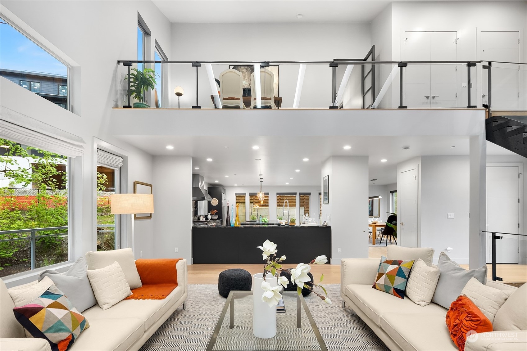 4312 West Cramer Street Seattle, WA 98199 - Photo 7 of 40 a living room with furniture and a large window