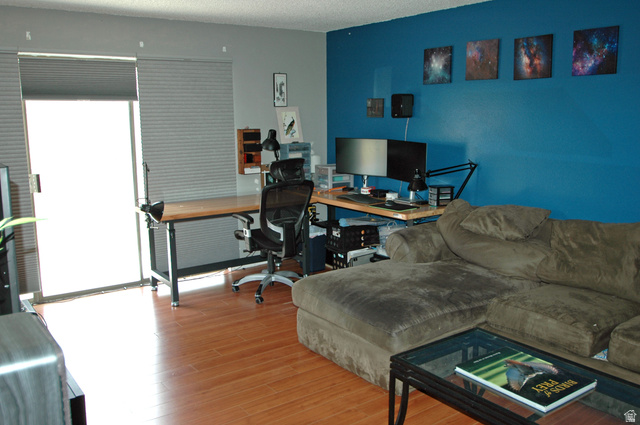 46 Lester Avenue, Unit G 24 Murray, UT 84107 - Photo 9 of 16 Seller uses part of the living room as his office.