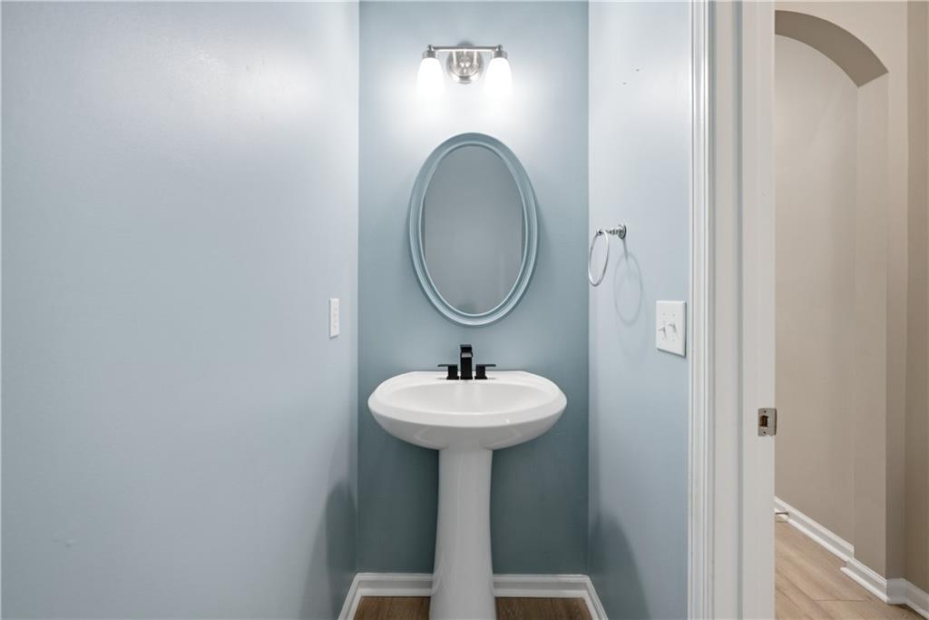 535 Ridge View Crossing Woodstock, GA 30188 - Photo 16 of 45 a bathroom with a sink and a mirror