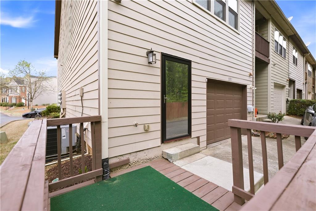 535 Ridge View Crossing Woodstock, GA 30188 - Photo 30 of 45 a view of a house with backyard and wooden fence