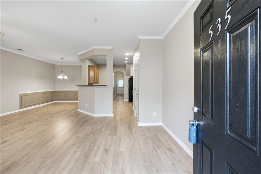 535 Ridge View Crossing Woodstock, GA 30188 - Photo 3 of 45 a view of a kitchen cabinets and wooden floor