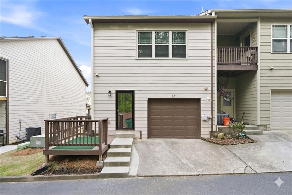 535 Ridge View Crossing Woodstock, GA 30188 - Photo 32 of 45 a front view of a house with entryway