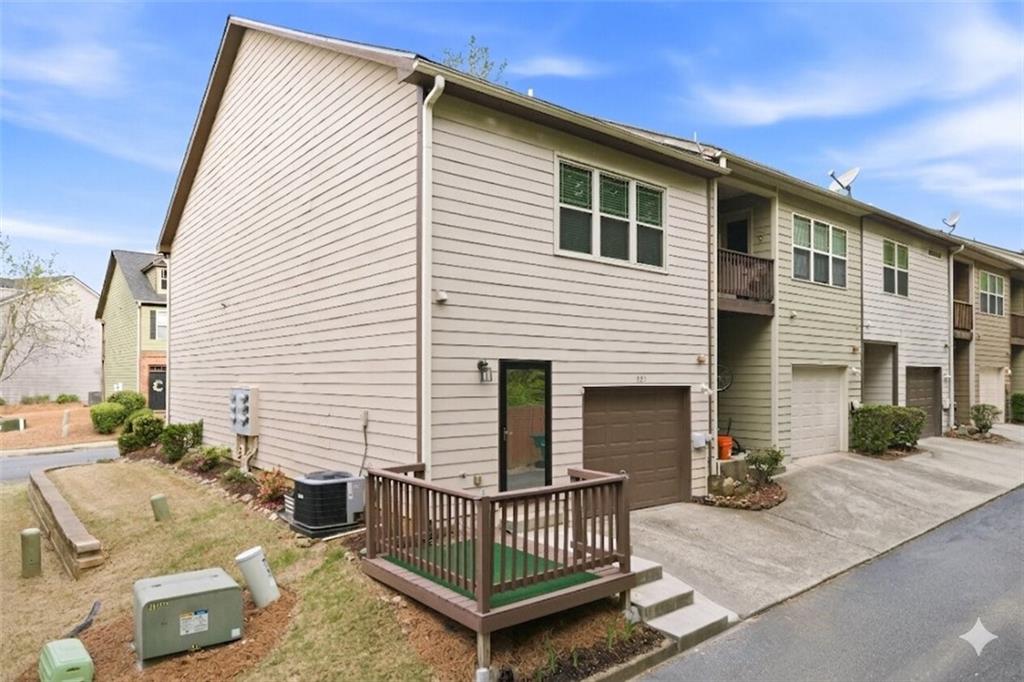 535 Ridge View Crossing Woodstock, GA 30188 - Photo 33 of 45 a view of a house with a small roof deck