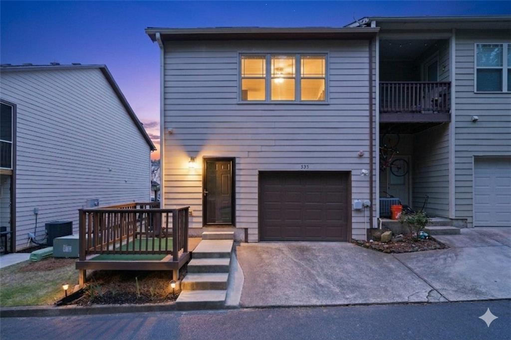 535 Ridge View Crossing Woodstock, GA 30188 - Photo 34 of 45 a view of a house with a yard and stairs