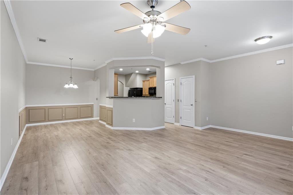 535 Ridge View Crossing Woodstock, GA 30188 - Photo 8 of 45 a view of a kitchen with a dishwasher cabinets and wooden floor