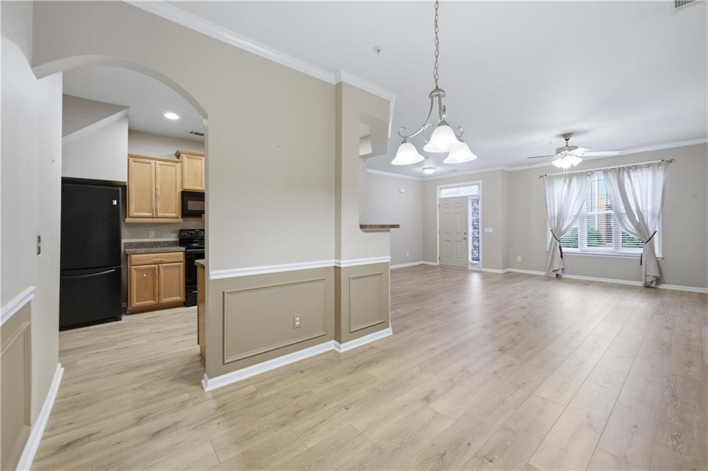 535 Ridge View Crossing Woodstock, GA 30188 - Photo 10 of 45 a view of a kitchen with a sink and a refrigerator
