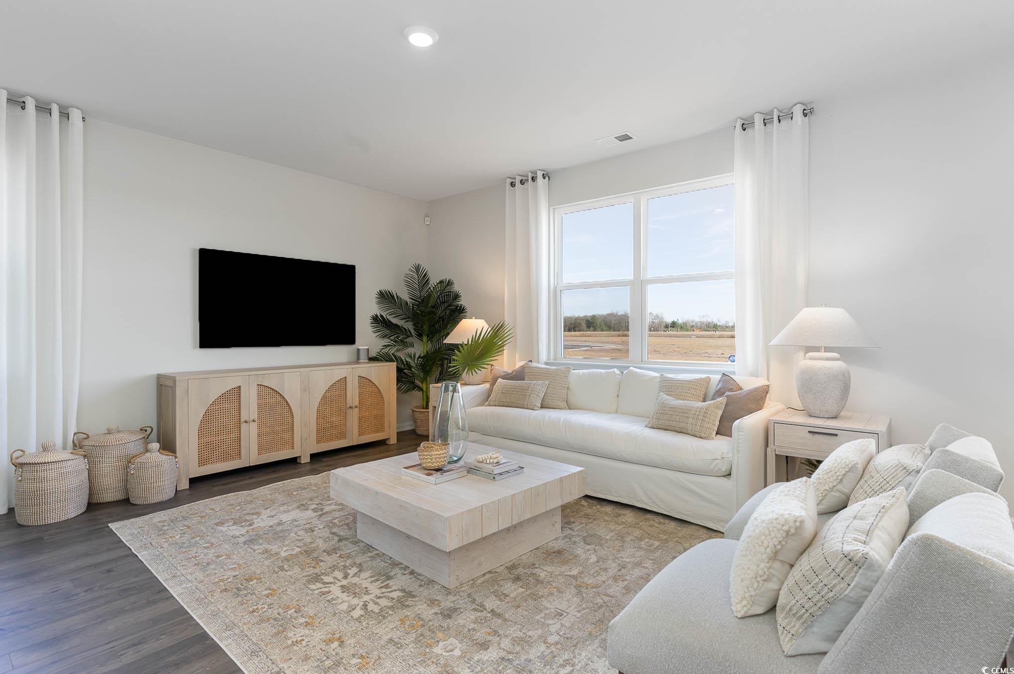 357 Acosta Circle Conway, SC 29527 - Photo 12 of 27 Living area featuring wood finished floors and recessed lighting