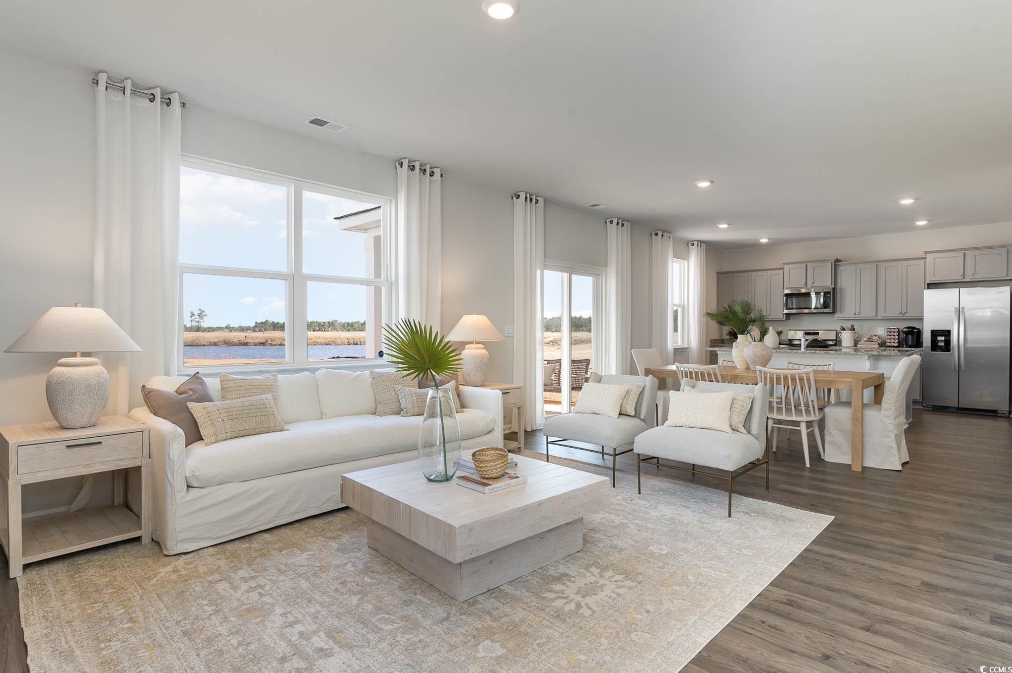 357 Acosta Circle Conway, SC 29527 - Photo 14 of 27 Living area featuring recessed lighting, wood finished floors, and a water view