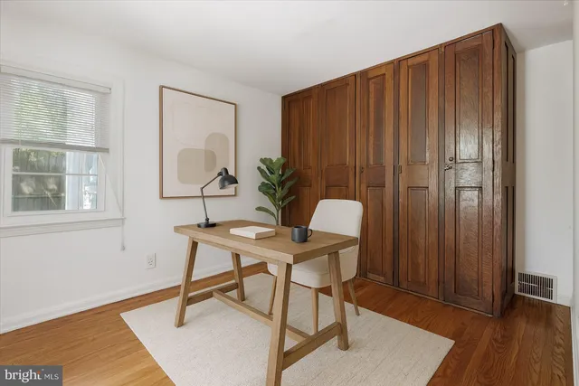 a view of a livingroom with furniture and wooden floor