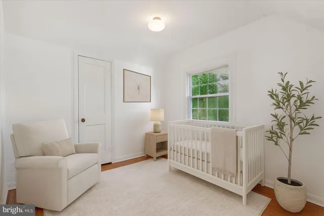 a bed room with a bed and a couch