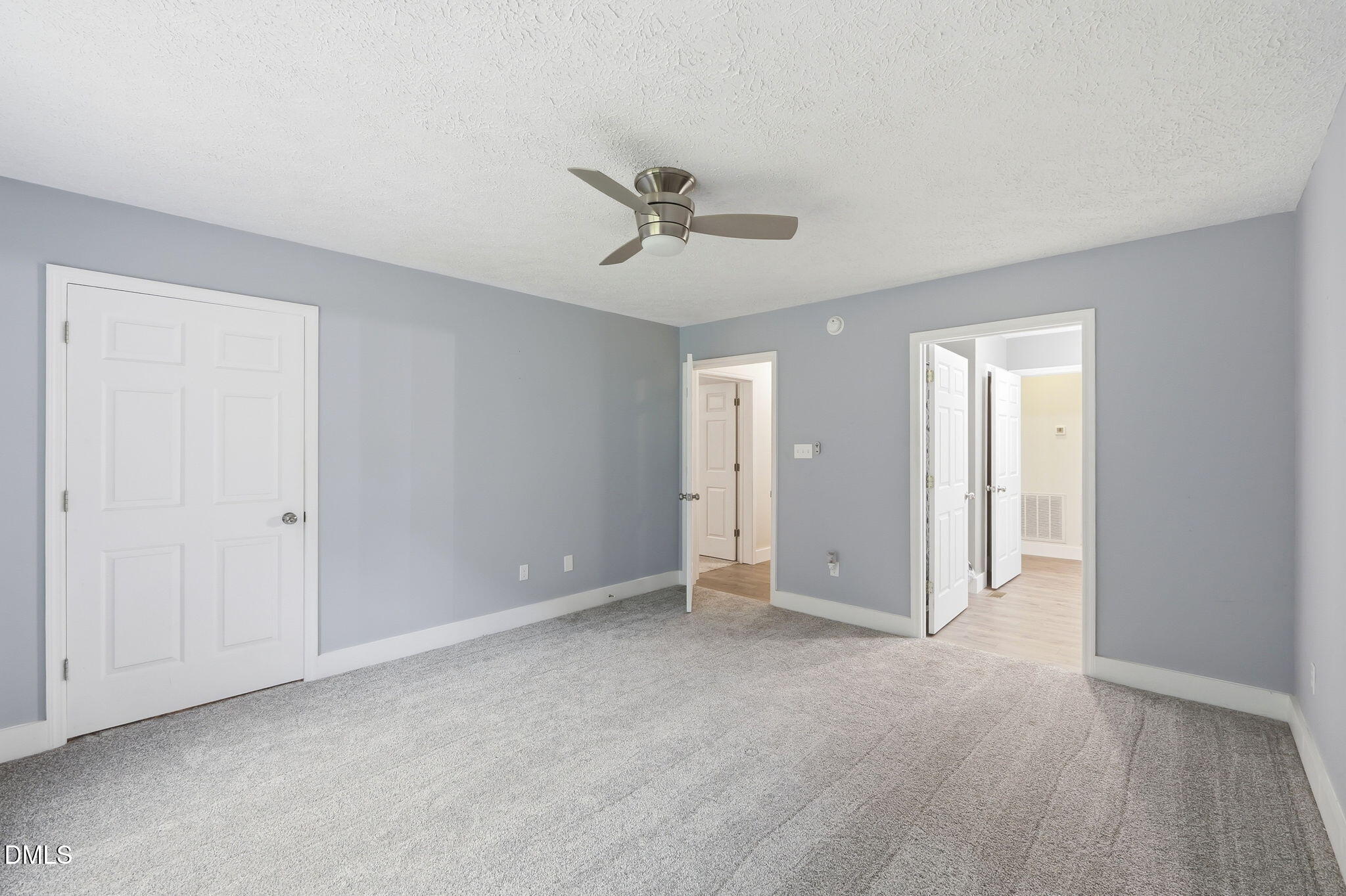 1925 Old Allensville Road Roxboro, NC 27574 - Photo 46 of 58 a view of an empty room with a ceiling fan
