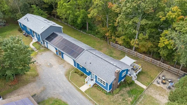 a view of a two chairs in the balcony