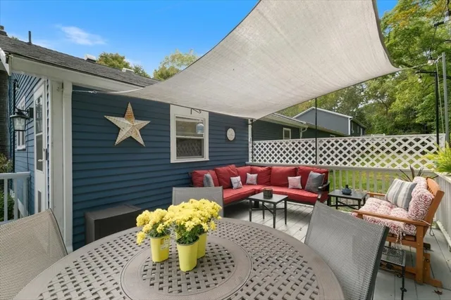a view of a chairs and table in the patio