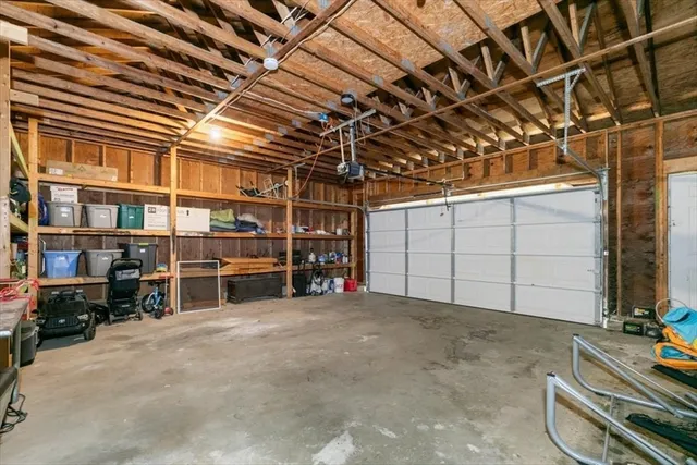 a view of a garage with wooden wall