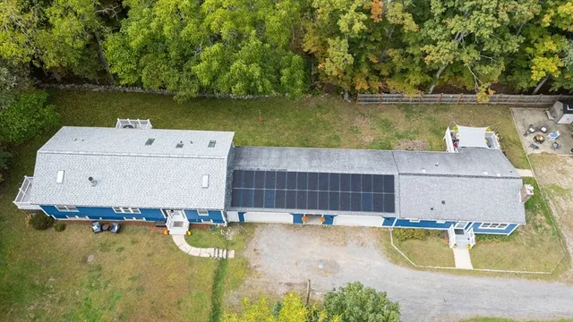 a view of a swimming pool with a lake view