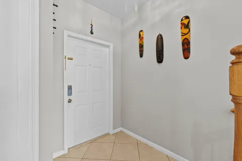 a kitchen with stainless steel appliances granite countertop a sink refrigerator and a stove