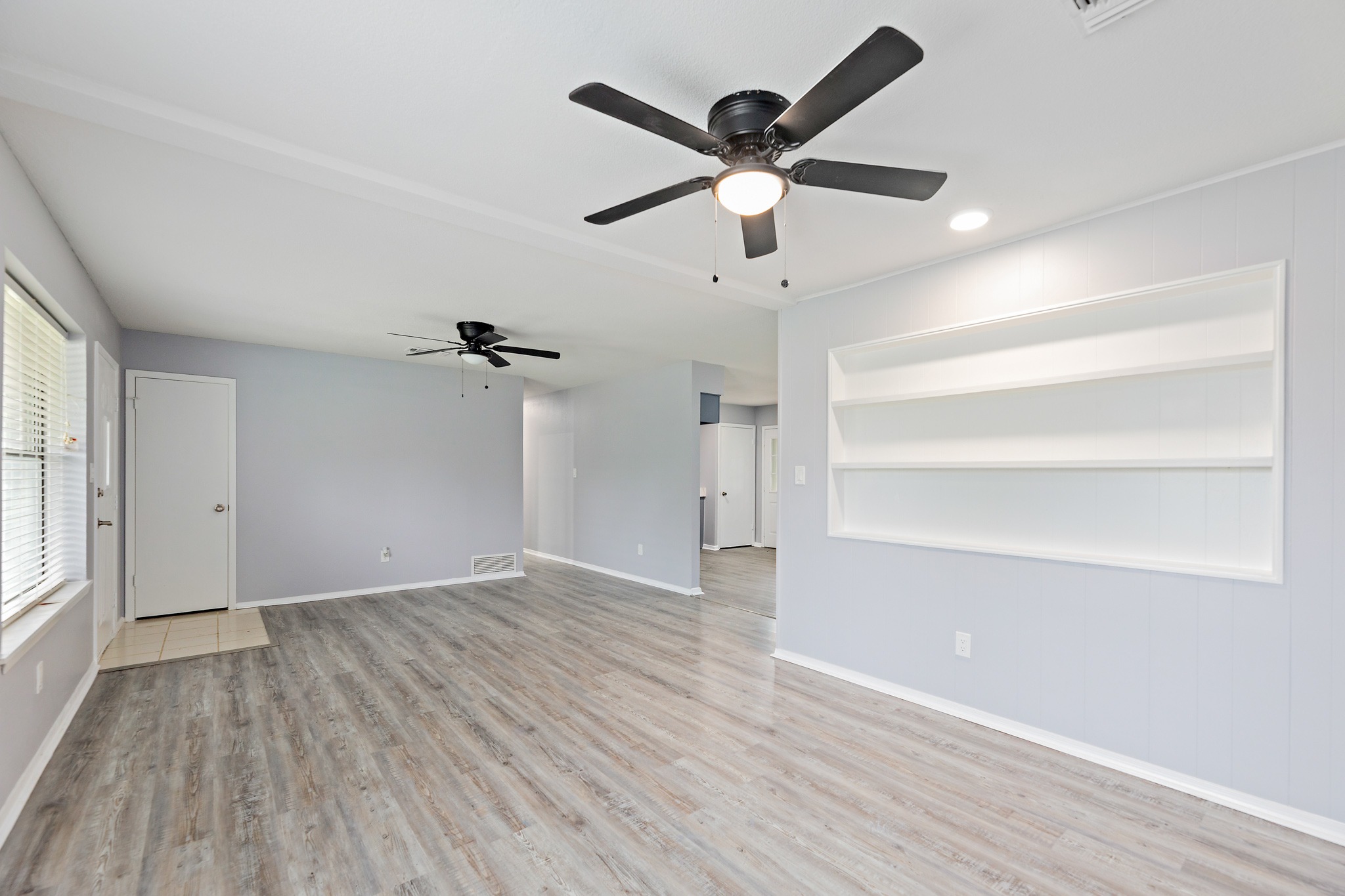 205 Hitching Post Road Kyle, TX 78640 - Photo 7 of 20 The living area has the flexibility to keep this dining space in the mix or stretch out into an even larger family room.