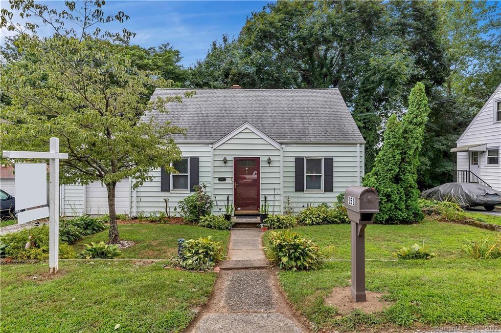 151 Broadmere Road Stratford, CT 06614 - Photo 1 of 1 a front view of house with yard and green space