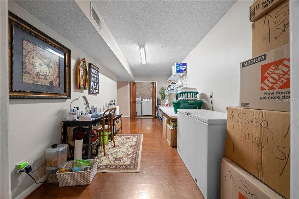 430 Southwest 43rd Place Ocala, FL 34471 - Photo 33 of 83 a living room with furniture and a wooden floor