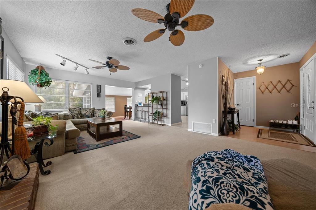 430 Southwest 43rd Place Ocala, FL 34471 - Photo 43 of 83 a view of a livingroom with furniture and a ceiling fan
