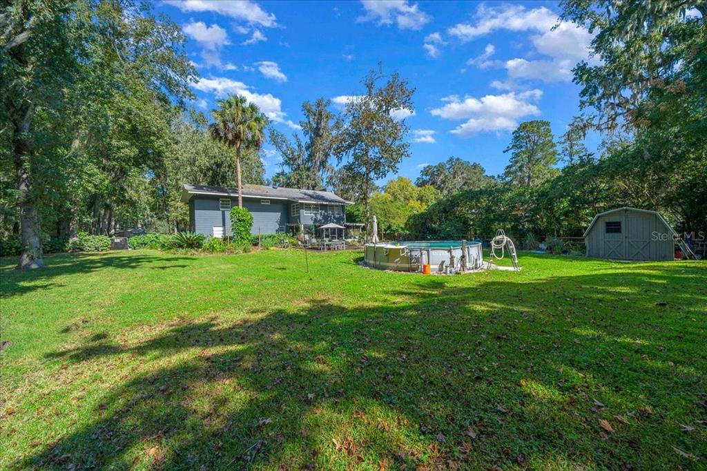 430 Southwest 43rd Place Ocala, FL 34471 - Photo 75 of 83 a view of a house with a big yard