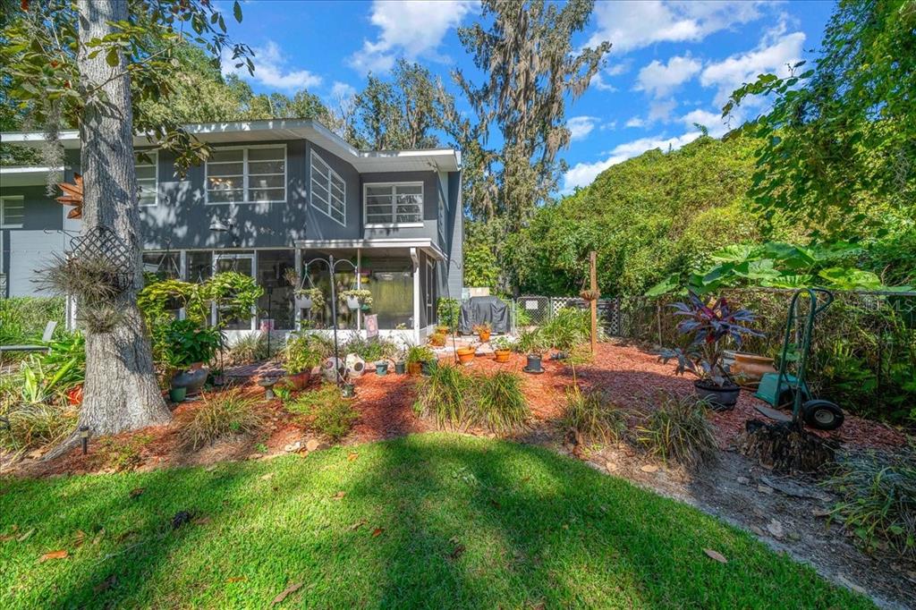 430 Southwest 43rd Place Ocala, FL 34471 - Photo 81 of 83 a view of a house with a backyard and sitting area