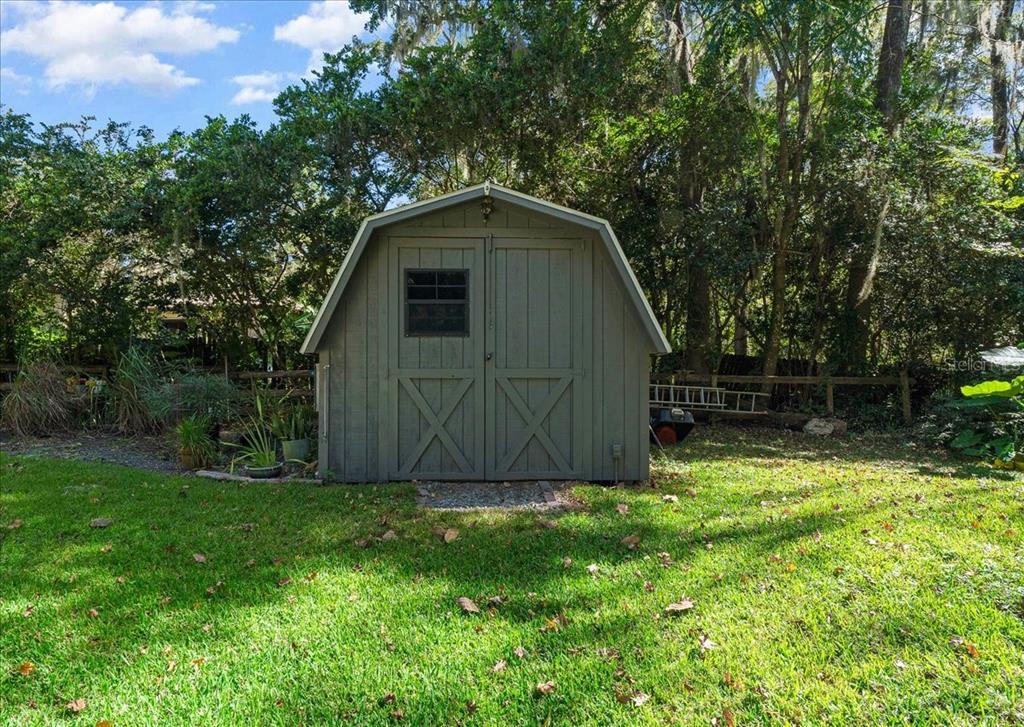 430 Southwest 43rd Place Ocala, FL 34471 - Photo 83 of 83 a view of backyard with garden and trees