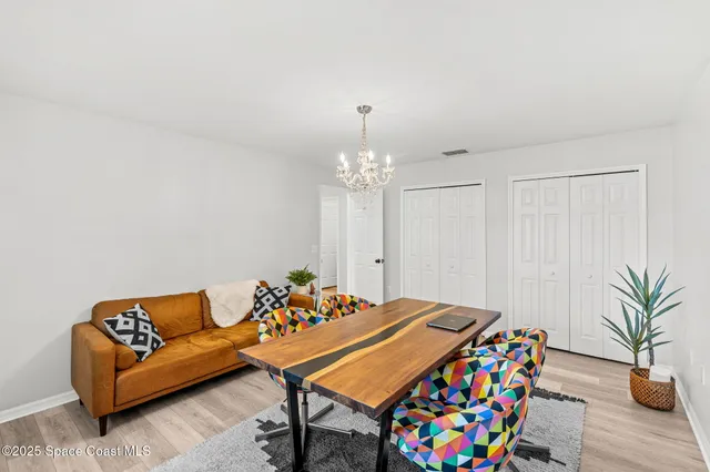 a bedroom with furniture and a table