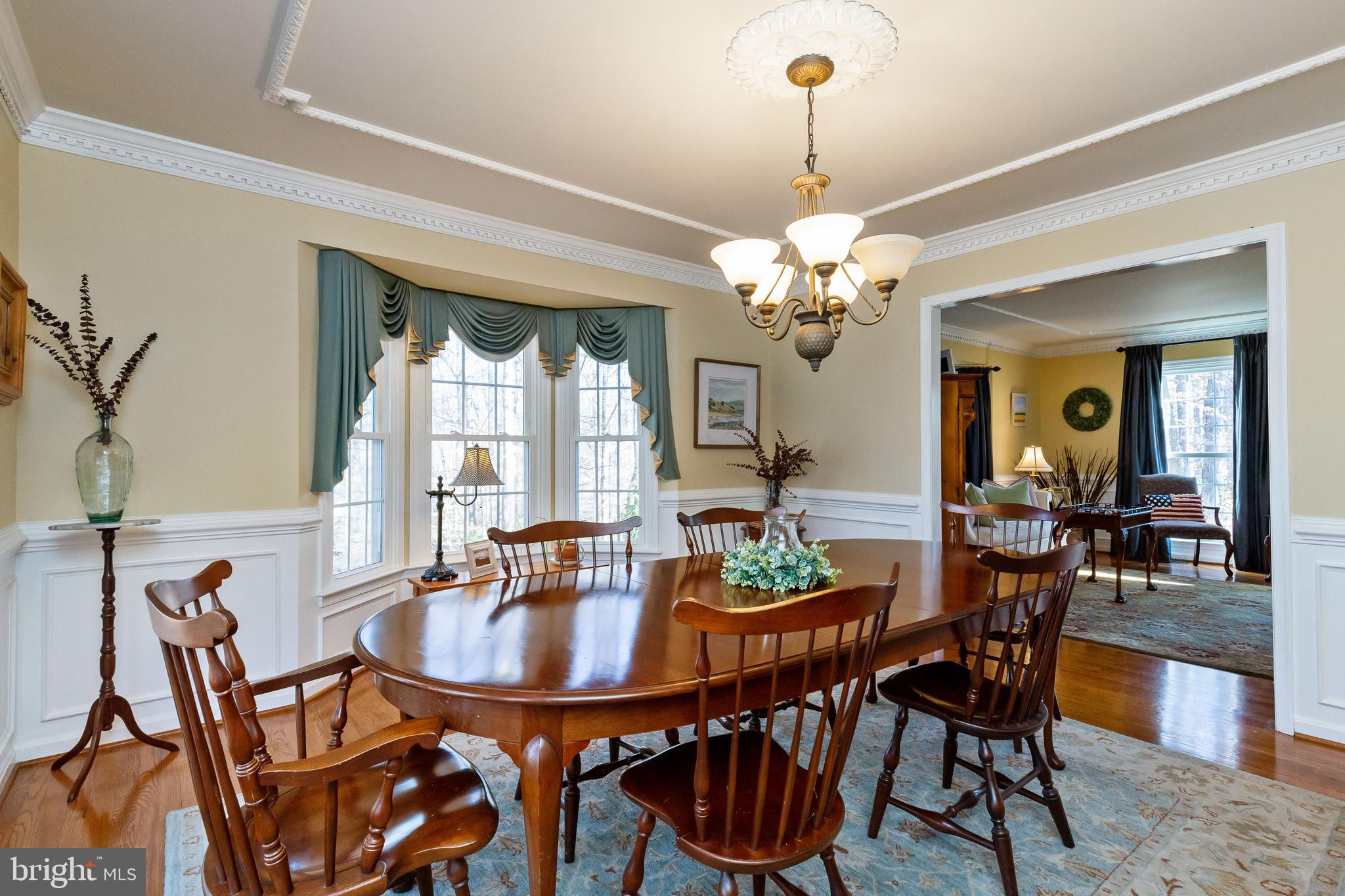 13080 Pershing Drive Manassas, VA 20112 - Photo 22 of 56 Formal dining room with 2 bay windows