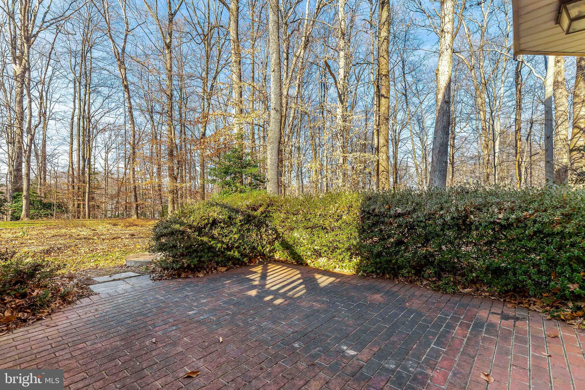 13080 Pershing Drive Manassas, VA 20112 - Photo 47 of 56 Step onto the brick patio from the basement
