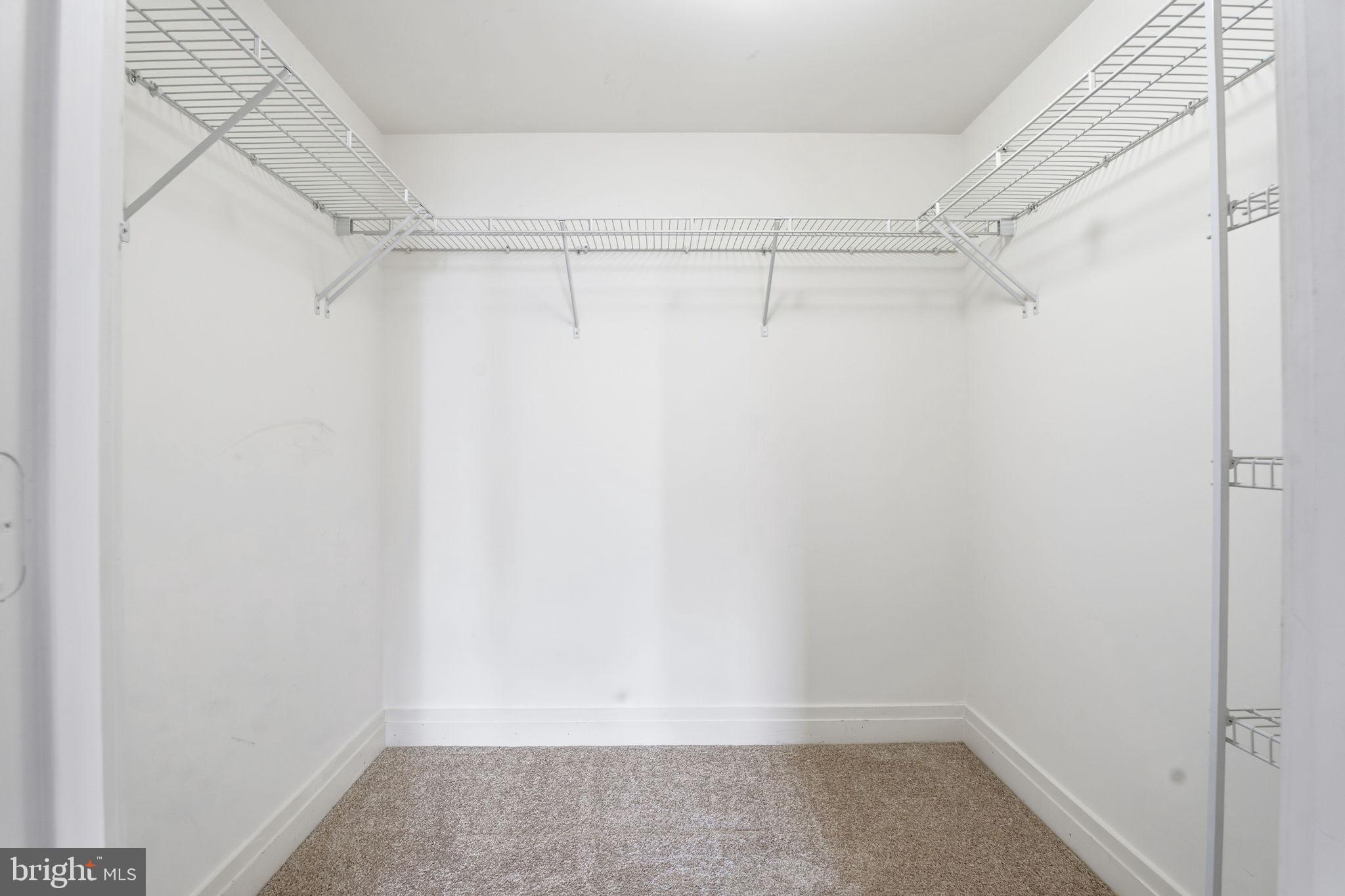 414 Water Street, Unit 1304 Baltimore, MD 21202 - Photo 16 of 24 a view of an empty walk in closet