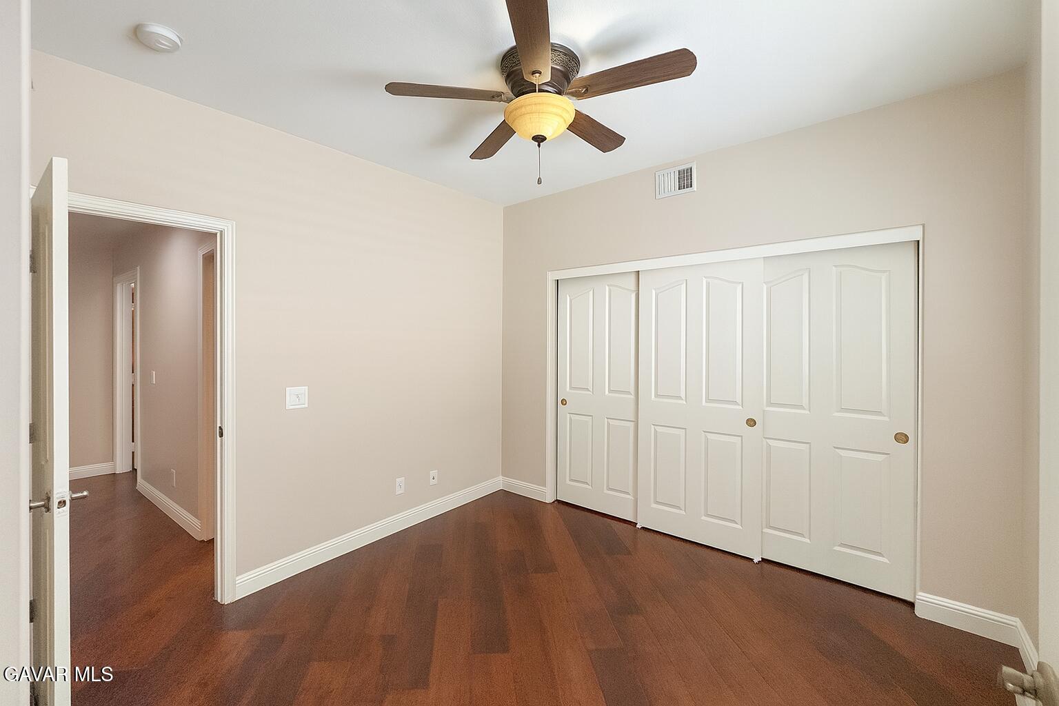 4011 Dee Dee Court Lancaster, CA 93536 - Photo 19 of 41 wooden floor in an empty room with a window