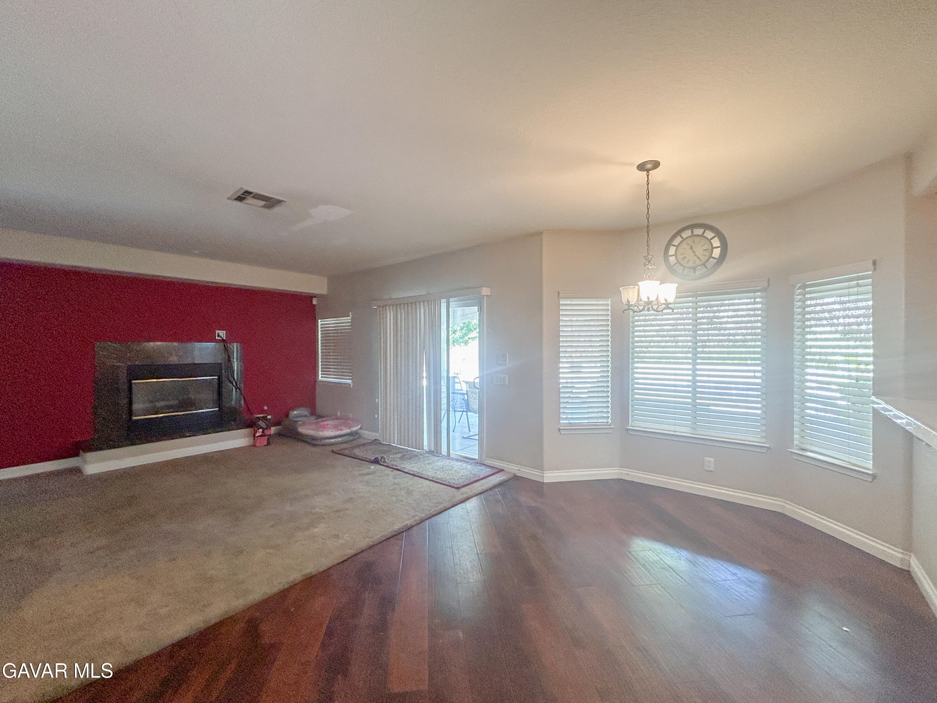 4011 Dee Dee Court Lancaster, CA 93536 - Photo 2 of 41 an empty room with windows and fireplace