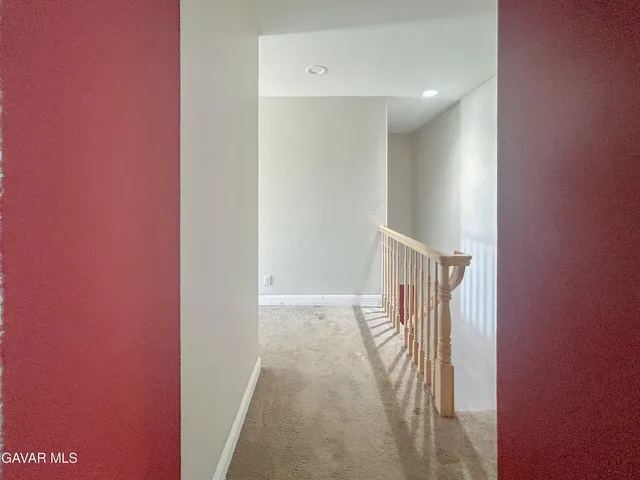 a view of hallway with stairs