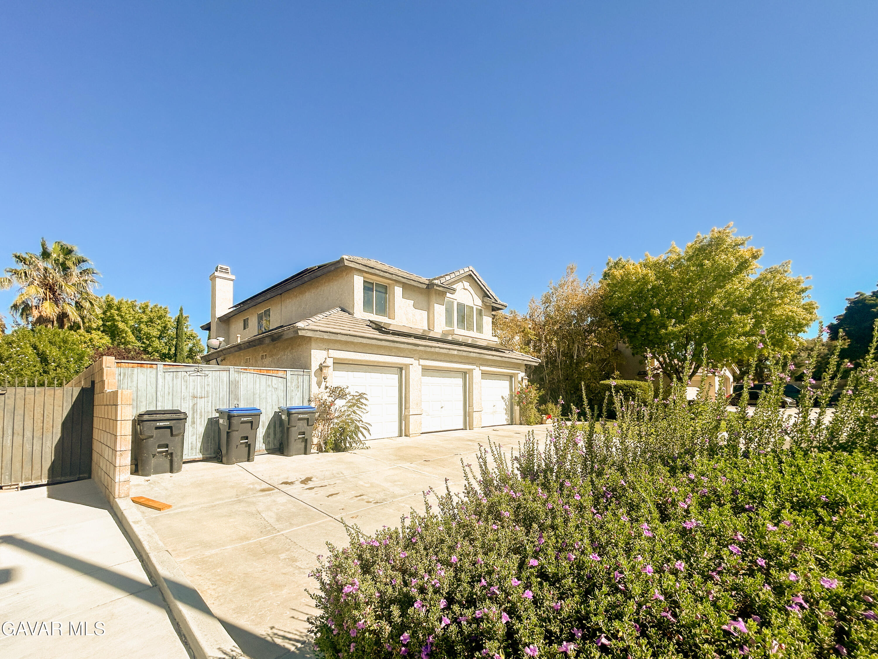 4011 Dee Dee Court Lancaster, CA 93536 - Photo 41 of 41 a front view of a house with a garden