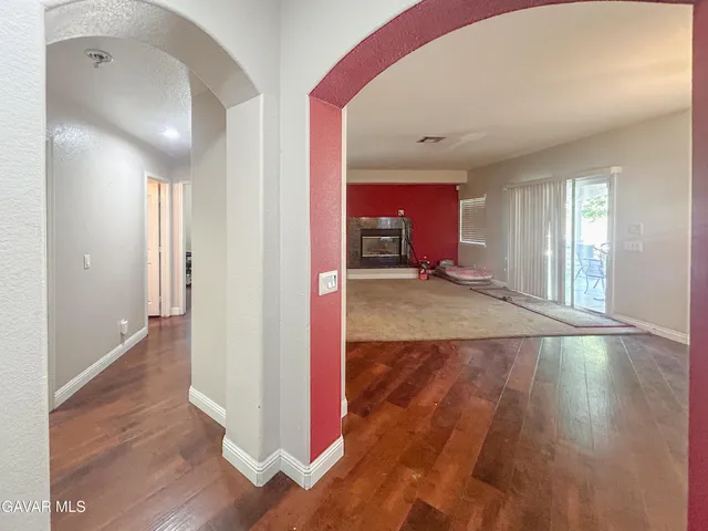 wooden floor in a hall with an entryway