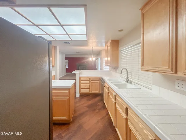 a bathroom with a sink a mirror and a bathtub