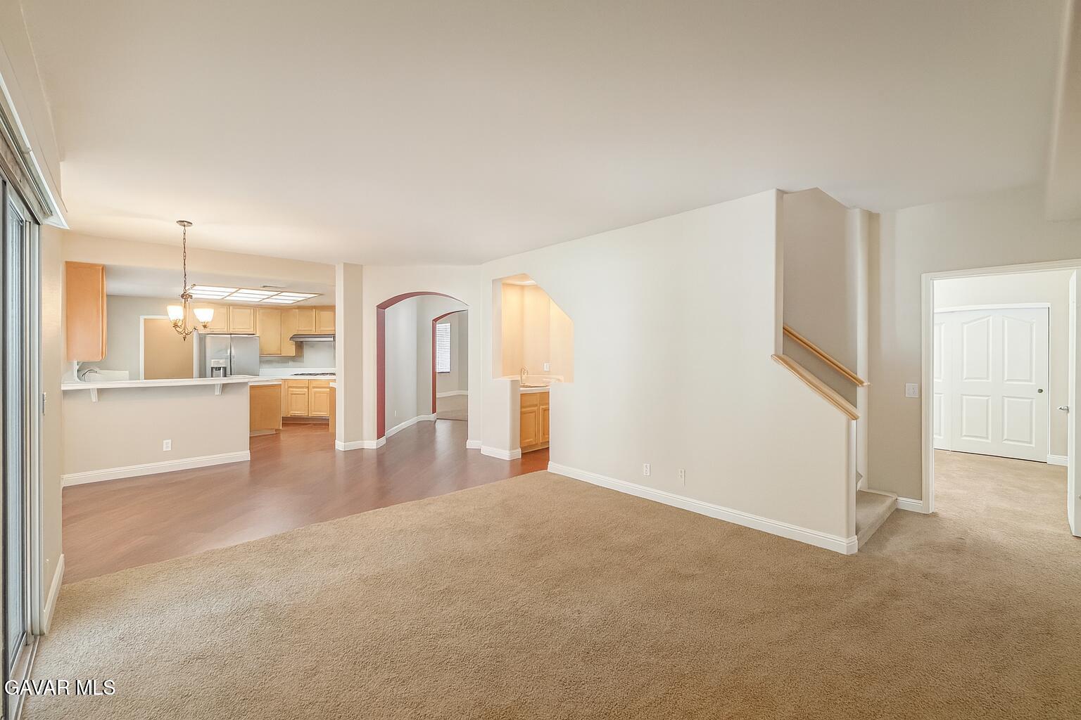 4011 Dee Dee Court Lancaster, CA 93536 - Photo 9 of 41 a view of a big room with entryway and wooden floor