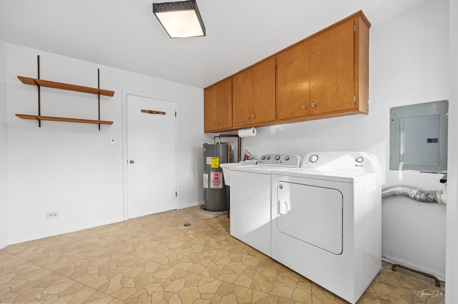 853 Cramer Court Willowbrook, IL 60527 - Photo 17 of 32 a utility room with dryer and washer
