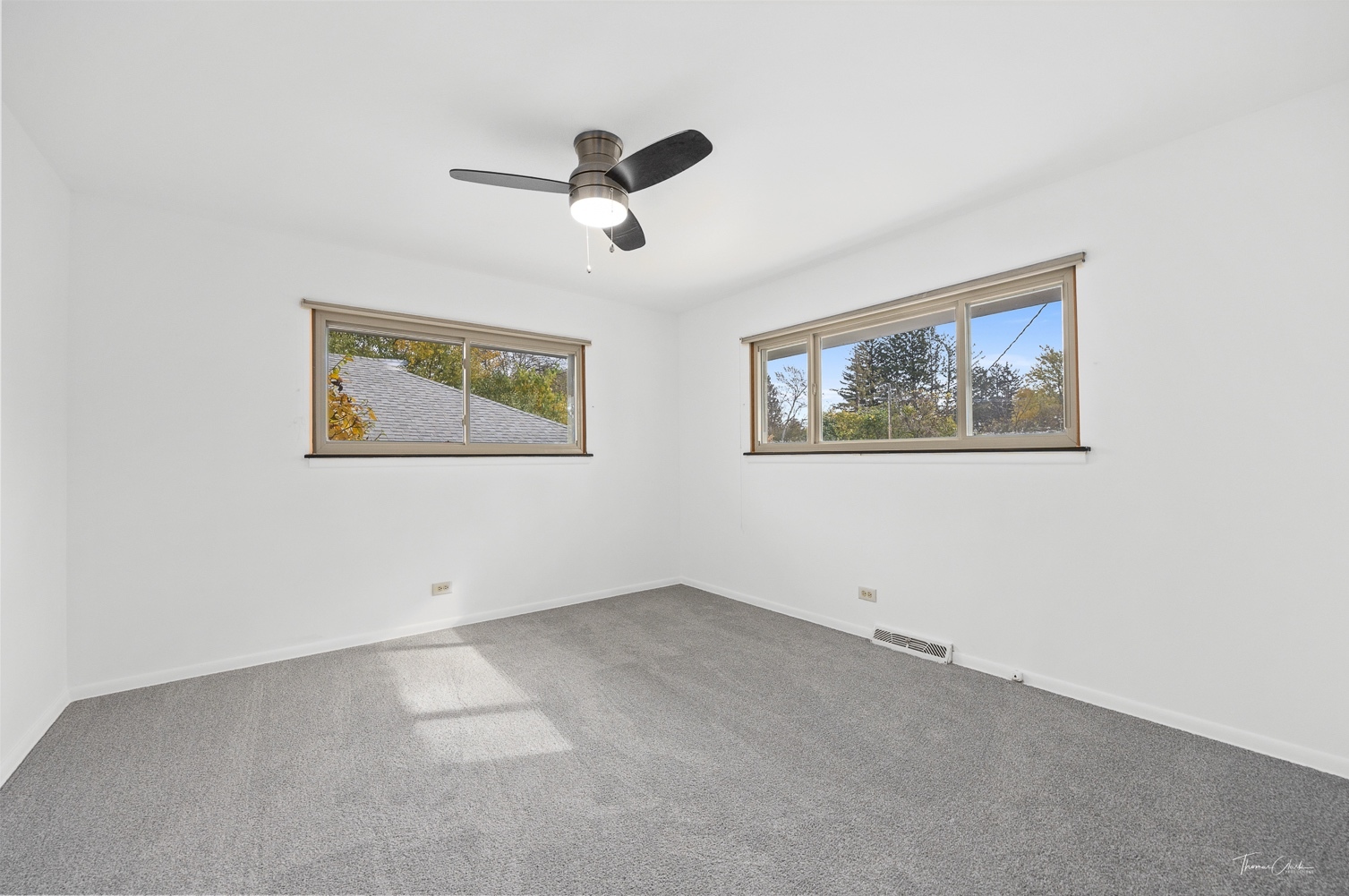 853 Cramer Court Willowbrook, IL 60527 - Photo 24 of 32 a view of empty room with windows