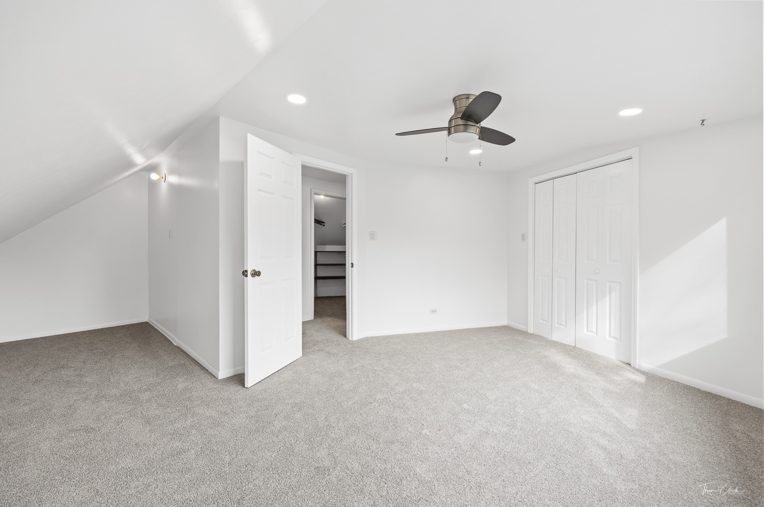 853 Cramer Court Willowbrook, IL 60527 - Photo 27 of 32 wooden floor in an empty room with a ceiling fan