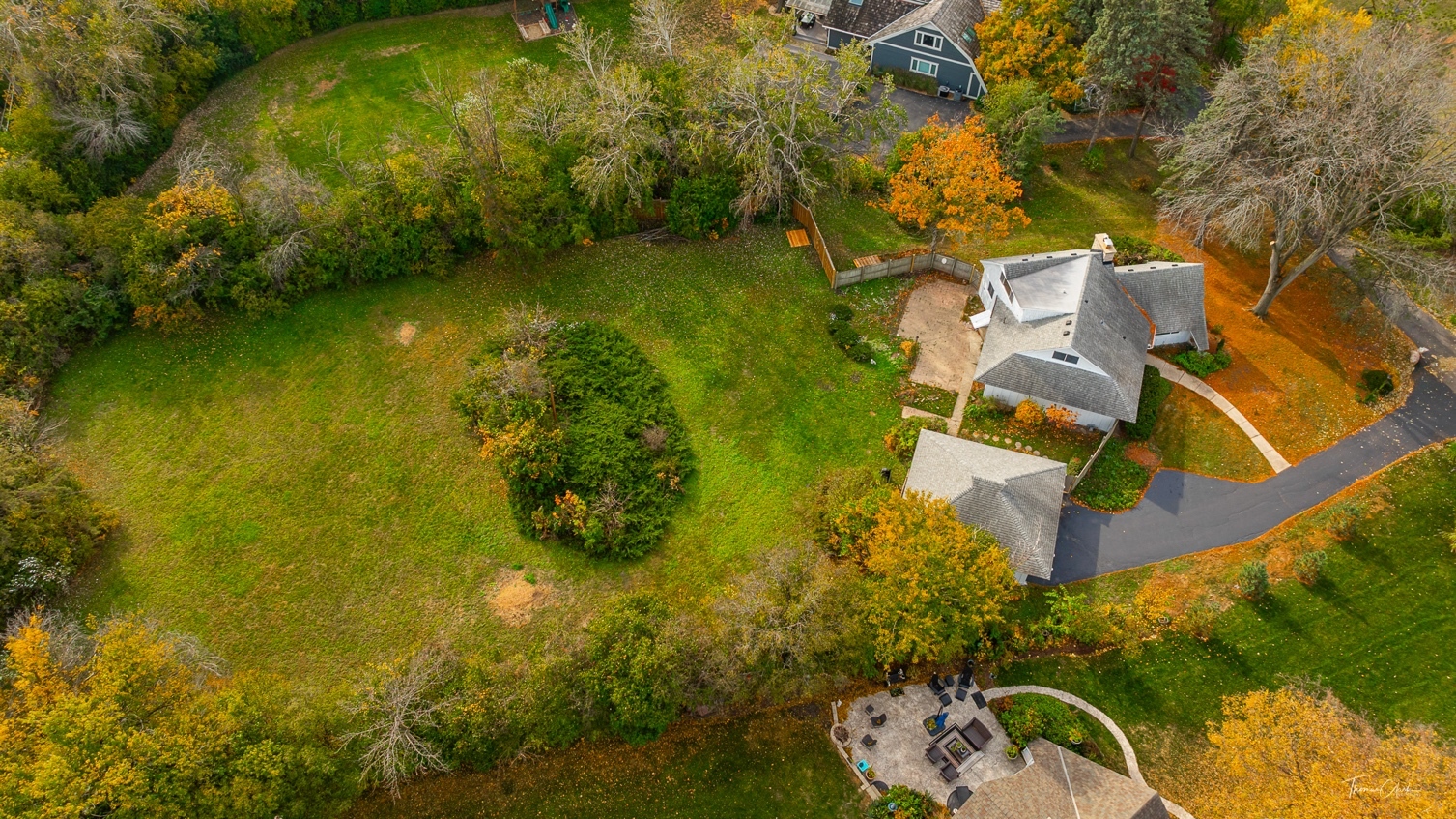 853 Cramer Court Willowbrook, IL 60527 - Photo 8 of 32 a aerial view of a house with a yard swimming pool and outdoor seating