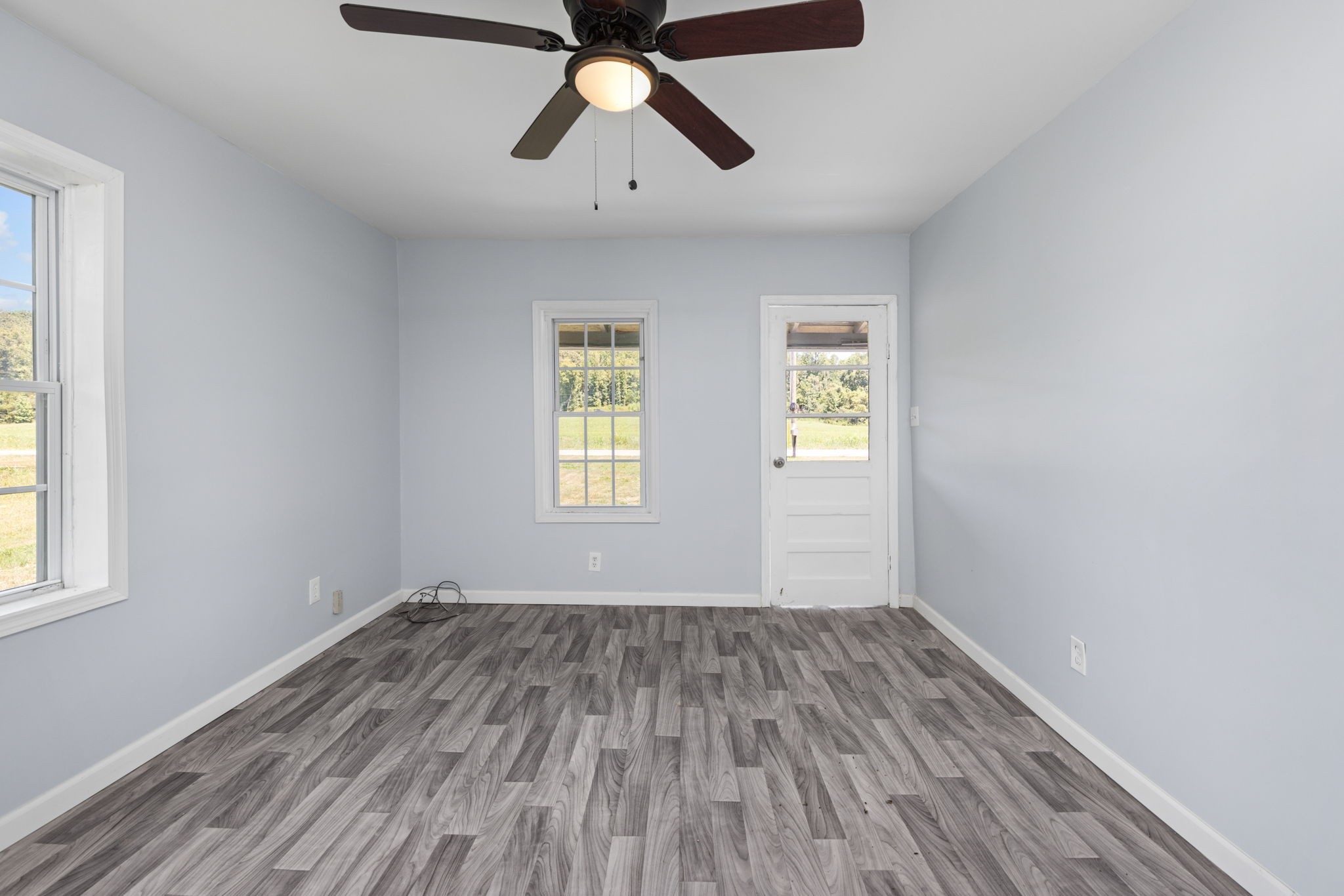 2732 Railroad Bed Road Iron City, TN 38463 - Photo 16 of 44 wooden floor in an empty room with a window