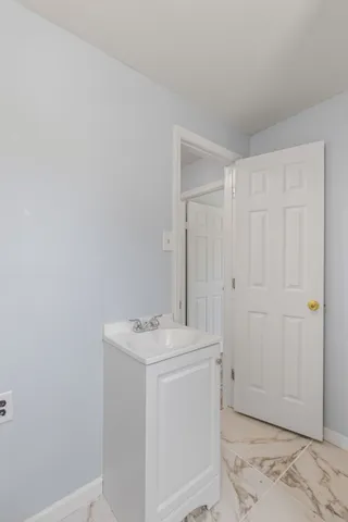 a bathroom with a sink and a bathtub