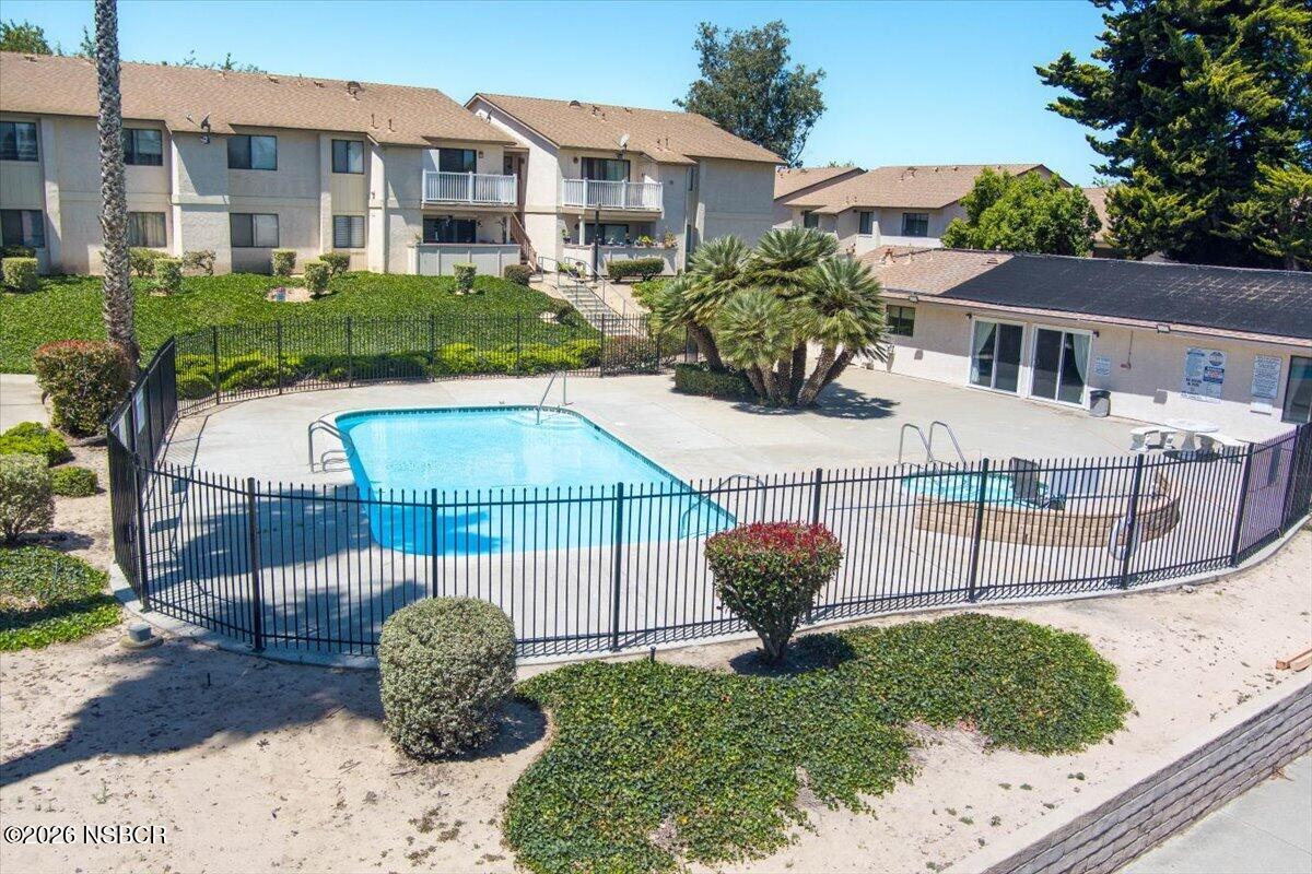 3400 Santa Maria Way, Unit 207B Santa Maria, CA 93455 - Photo 43 of 50 a front view of a house with a garden