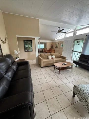 a kitchen with a sink a stove and cabinets